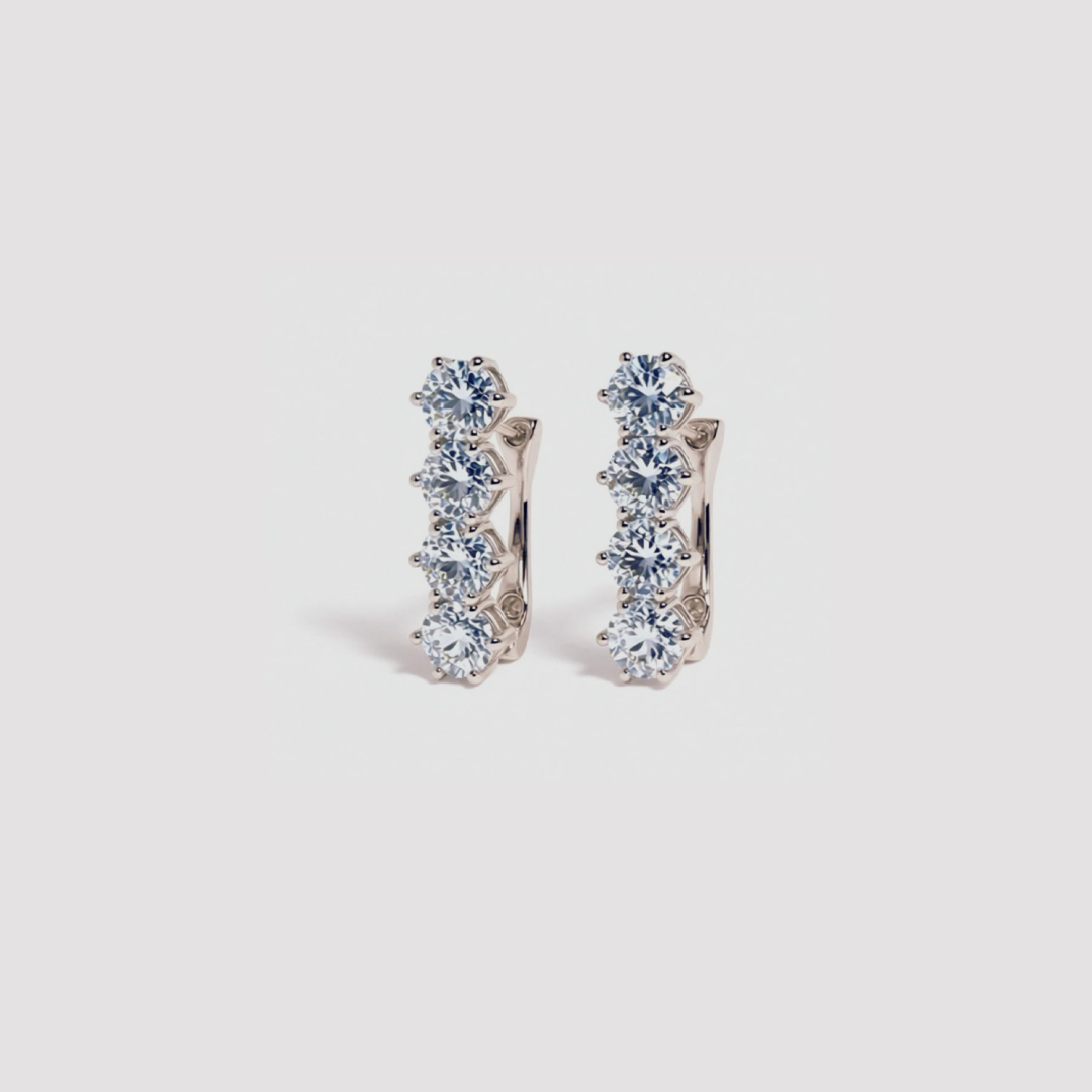 Blue Topaz Huggies